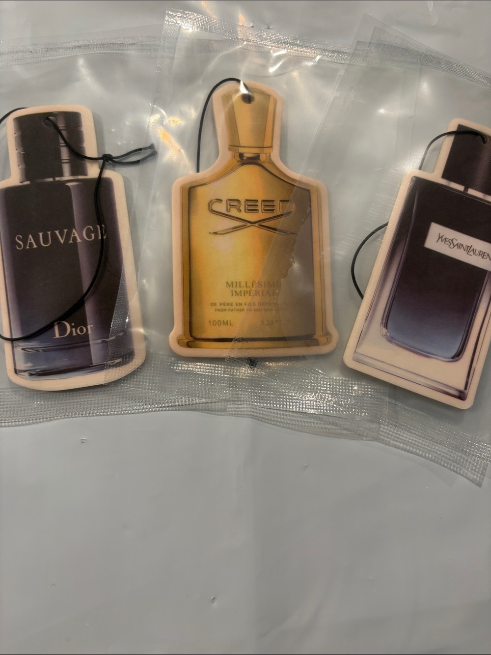 3 Pack Bundle Perfume Car Air Freshener by Freshie is a modern and stylish a